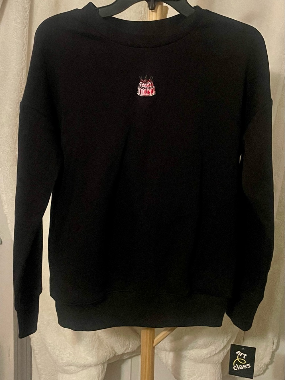 art class Black Crewneck Sweater with Pink Embroidered Cake